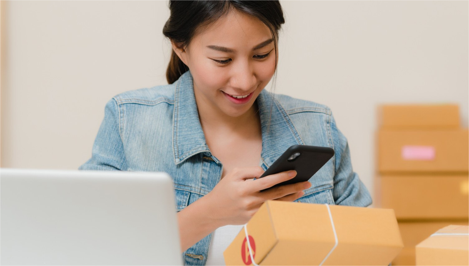 beautiful-smart-asian-young-entrepreneur-business-woman-owner-sme-checking-product-stock-scan-qr-code-working-home